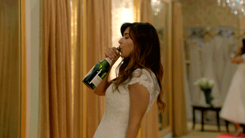 Dress, Flowerpot, Bottle, Drink, Long hair, Houseplant, Waist, Bride, Wedding dress, Drinking, 