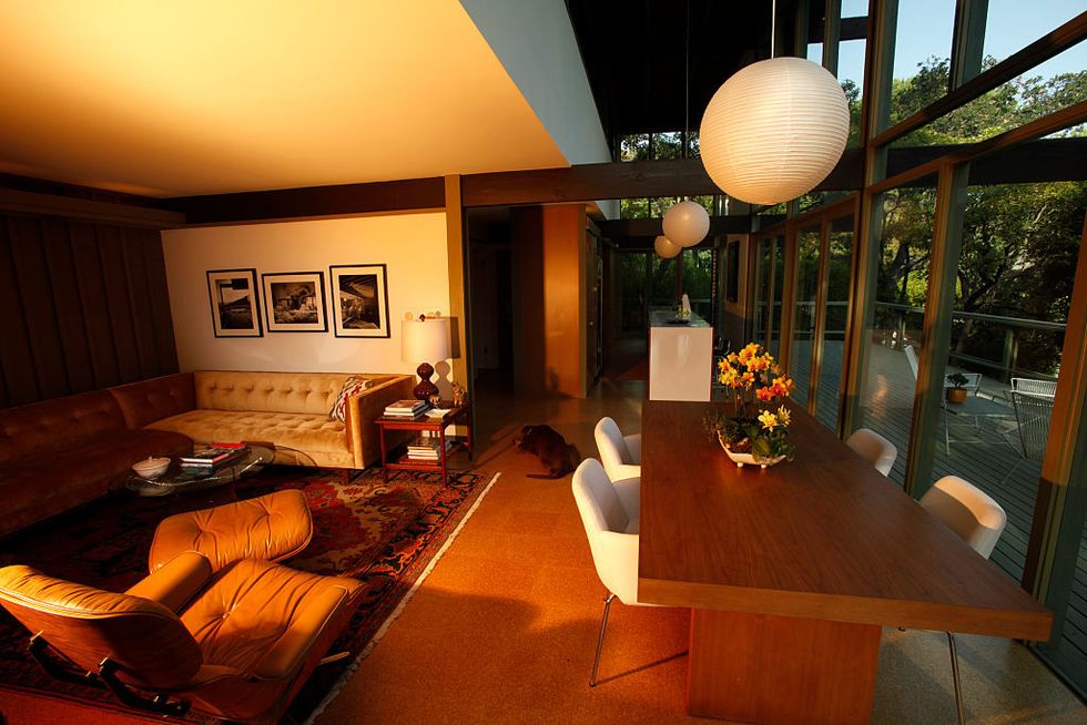 Lighting, Room, Interior design, Wood, Floor, Flooring, Table, Furniture, Living room, Couch, 