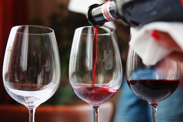 Stemware, Glass, Drinkware, Wine glass, Drink, Fluid, Barware, Red, Alcoholic beverage, Bottle, 