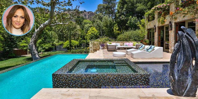 Property, Tree, Real estate, Swimming pool, Garden, Resort, Water feature, Backyard, Composite material, Courtyard, 