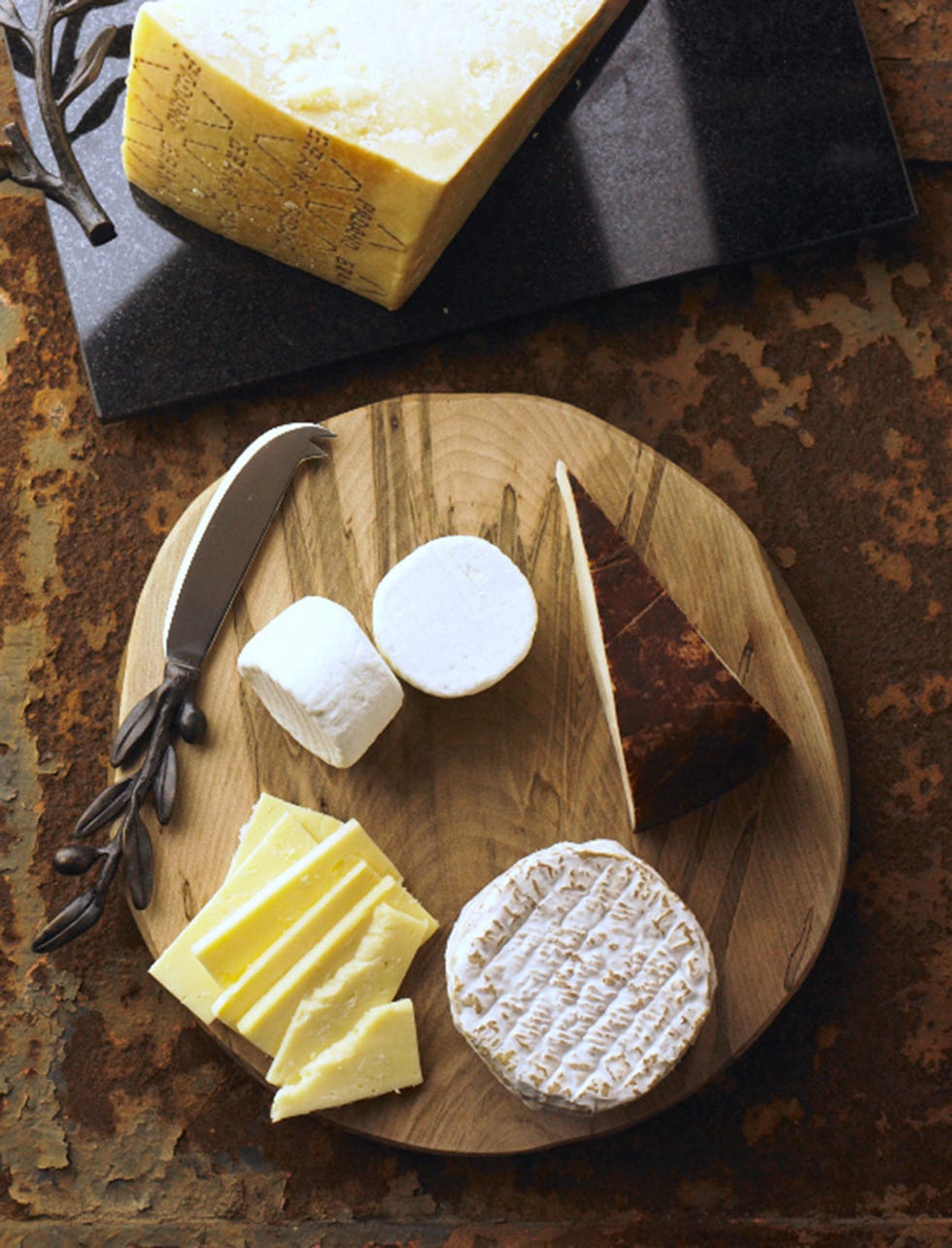 Ingredient, Food, Cheese, Dairy, Parmigiano-reggiano, Cutting board, Kitchen utensil, Camembert Cheese, Cuisine, Toma cheese, 