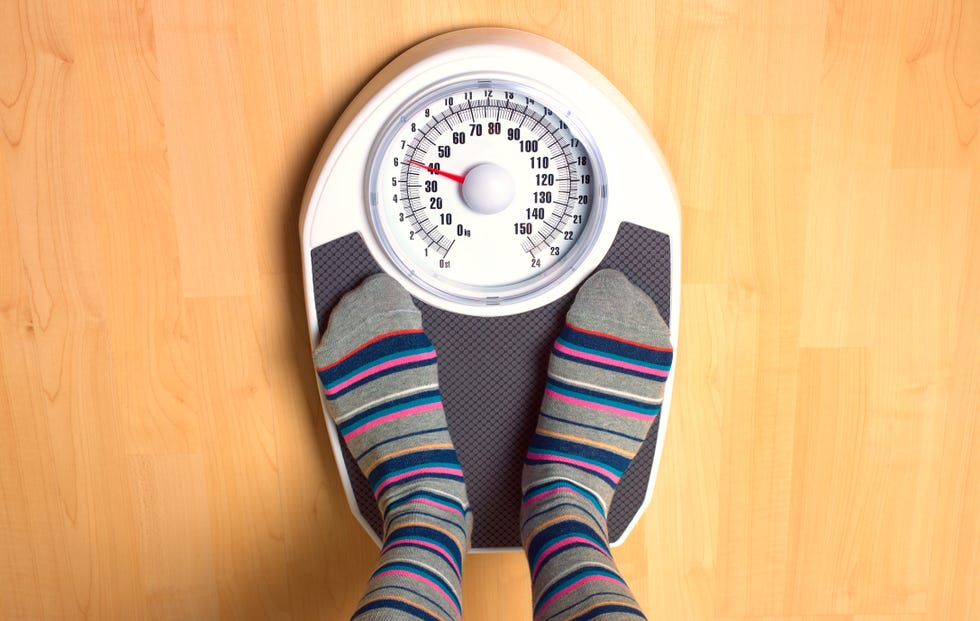Human leg, Sock, Hardwood, Measuring instrument, Gauge, Wood stain, Circle, Number, Peach, Tights, 