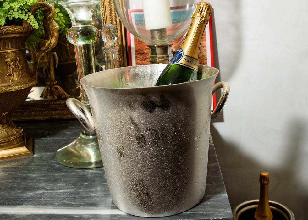 Glass, Drinkware, Serveware, Brass, Kitchen utensil, Still life photography, Bottle, Bronze, Home accessories, Glass bottle, 