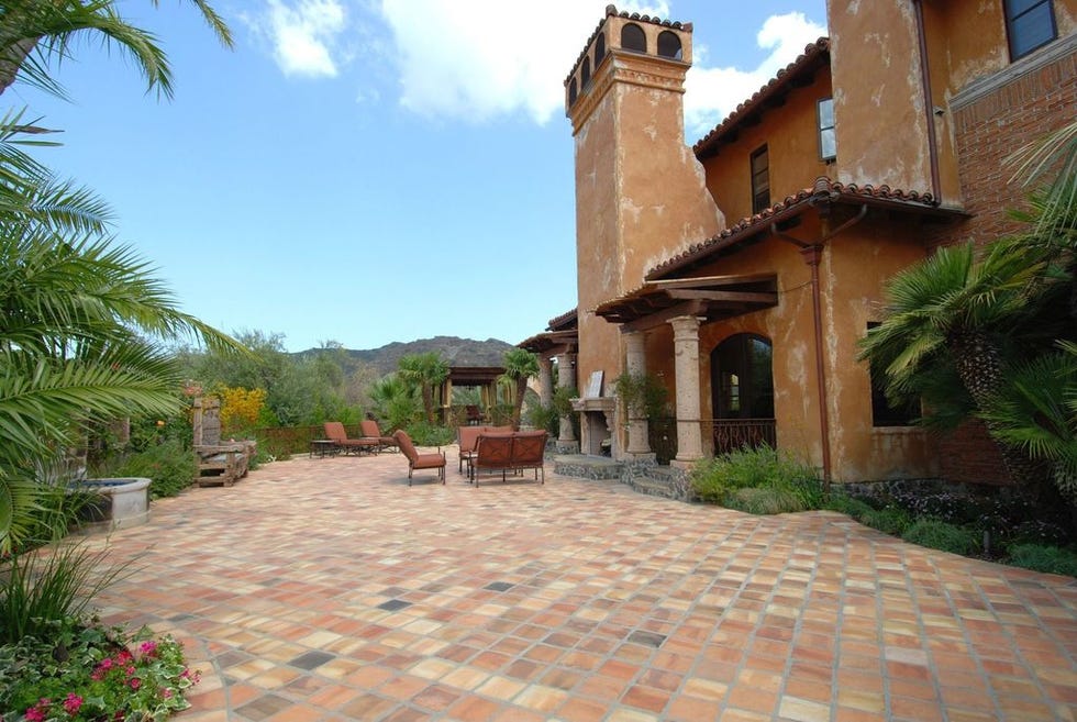Plant, Real estate, Arecales, Garden, Door, Resort, Hacienda, Cobblestone, Courtyard, Outdoor furniture, 