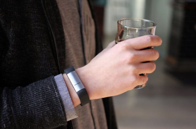 Clothing, Glass, Drinkware, Drink, Fluid, Outerwear, Alcohol, Alcoholic beverage, Tableware, Barware, 