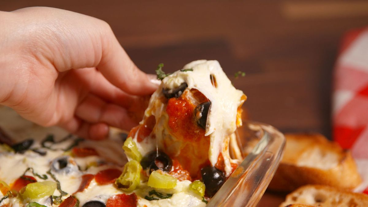 preview for You'll Become Famous For This Pizza 7-Layer Dip