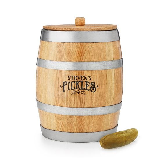 <p><strong data-redactor-tag="strong" data-verified="redactor"><em data-redactor-tag="em" data-verified="redactor">$99</em></strong> <a href="http://www.uncommongoods.com/product/personalized-pickling-barrel" target="_blank" class="slide-buy--button" data-tracking-id="recirc-text-link">BUY NOW</a></p><p>A personalized pickle barrel is really the only answer to any question, I always say. Make large batches of homemade pickles the traditional way by fermenting them in wooden barrels over the course of one to two months.&nbsp;</p>