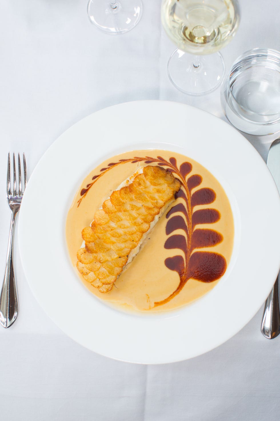 delish-disney-epcot-france-fish-potato-scale