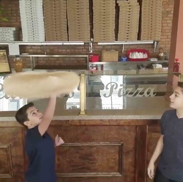 little boys pizza tossing