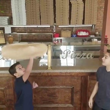 little boys pizza tossing