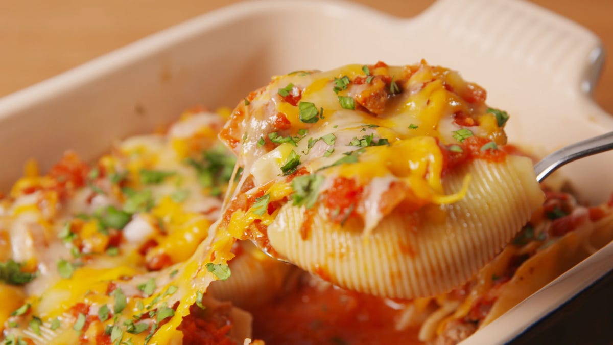 preview for Cheesy Taco Stuffed Shells are your Two Favorite Mexican and Italian Dishes in One!
