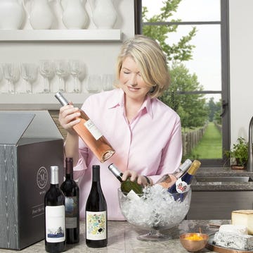 Bottle, Glass bottle, Wine bottle, Drink, Glass, Alcoholic beverage, Serveware, Squash, Shelf, Alcohol, 