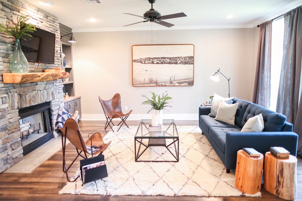 Living room, Room, Ceiling fan, Property, Furniture, Interior design, Mechanical fan, Building, House, Home, 