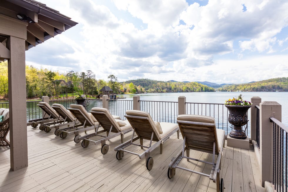 Wood, Cloud, Outdoor furniture, Real estate, Hardwood, Bank, Reservoir, Lake, Sunlounger, Loch, 