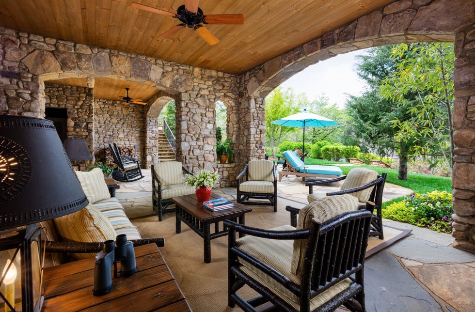 Wood, Room, Interior design, Hardwood, Ceiling, Real estate, Couch, Porch, Home, Outdoor furniture, 
