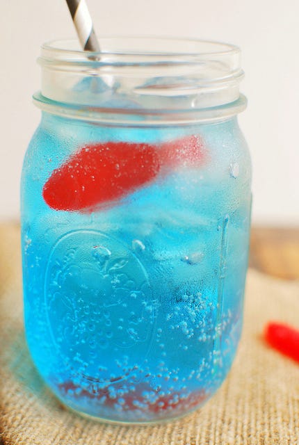 Mason jar, Italian soda, Drink, Aqua, Blue hawaii, Food, Blue lagoon, Food coloring, Non-alcoholic beverage, Drinkware, 