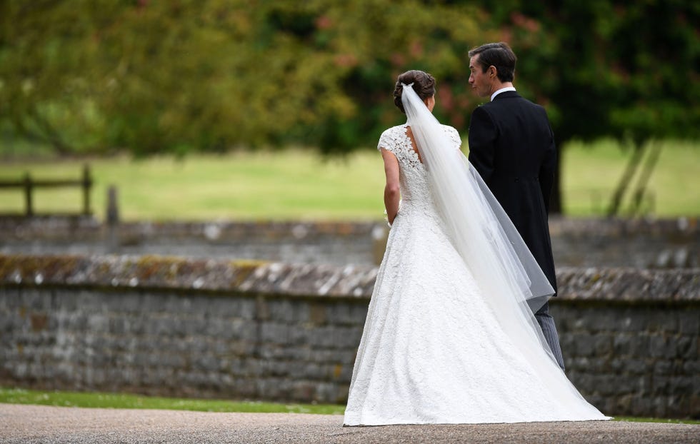 Clothing, Bridal veil, Veil, Coat, Bridal clothing, Dress, Photograph, Suit, Bride, Outerwear, 
