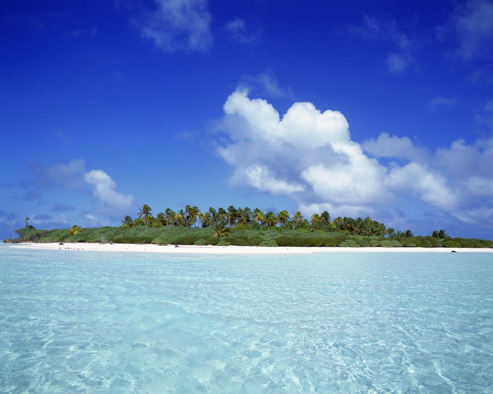 Body of water, Sky, Sea, Tropics, Ocean, Blue, Island, Daytime, Coastal and oceanic landforms, Water, 