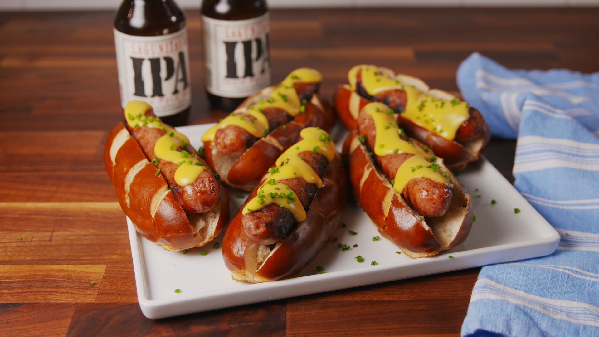 Best Cheesy Beer Brats Recipe How To Make Cheesy Beer Brats Delish Com