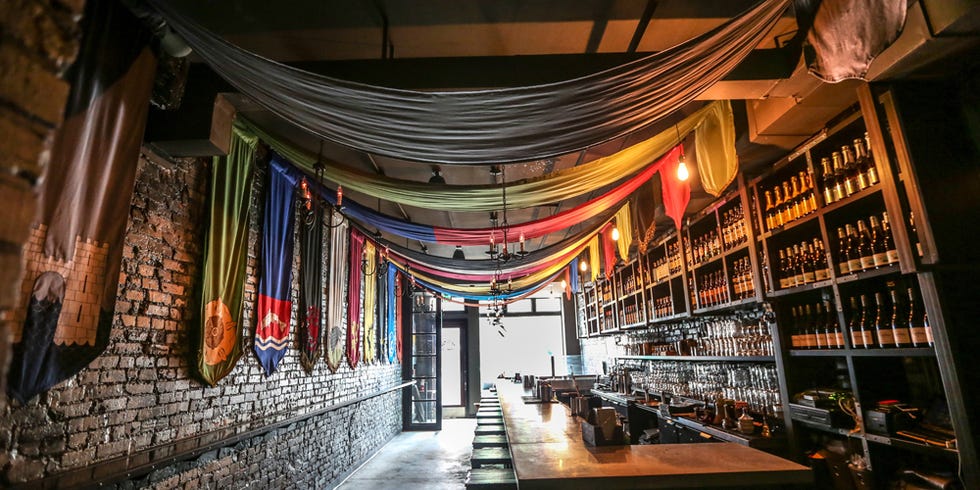 Textile, Interior design, Barware, Ceiling, Shelf, Drinking establishment, Distilled beverage, Alcohol, Interior design, Bottle, 