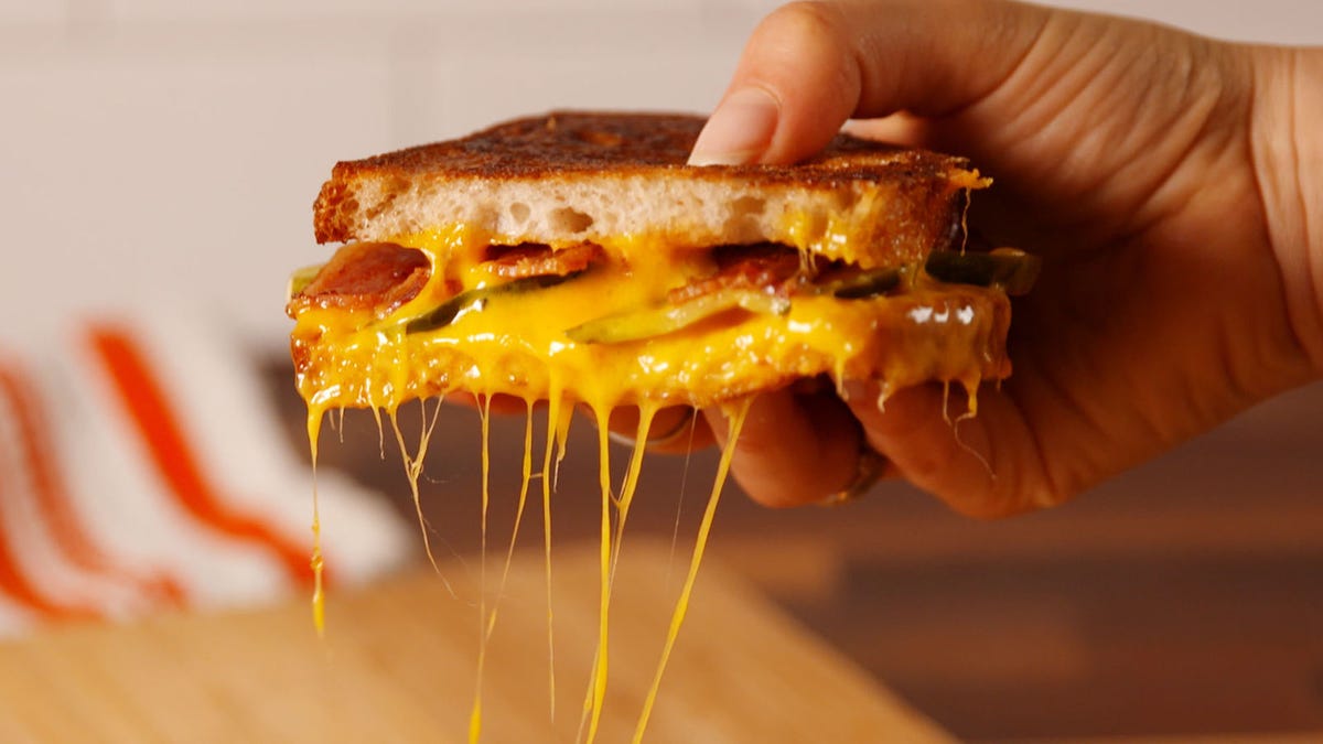 Video player poster image preview for Delish Pickle Bacon Grilled Cheese