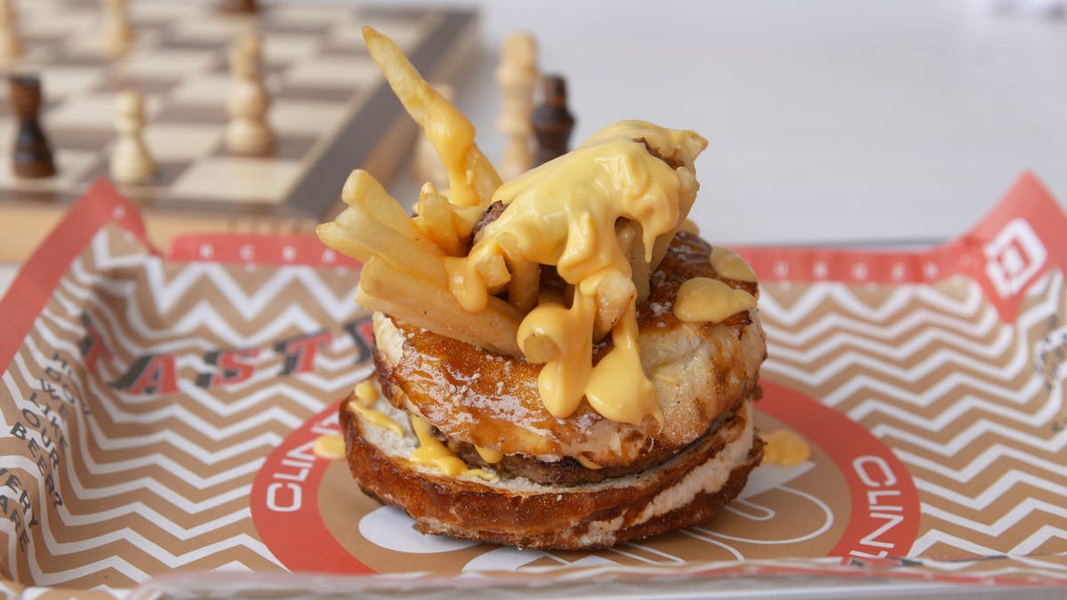 preview for This Is The Most Aggressive Way To Tackle A Burger and Fries