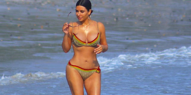 Clothing, Brassiere, Skin, Swimwear, Swimsuit top, Photograph, Bikini, Swimsuit bottom, Undergarment, Chest, 