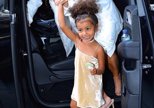 Luxury vehicle, Vehicle door, Hairstyle, Vehicle, Black hair, Car, Smile, Child, Family car, Vacation, 