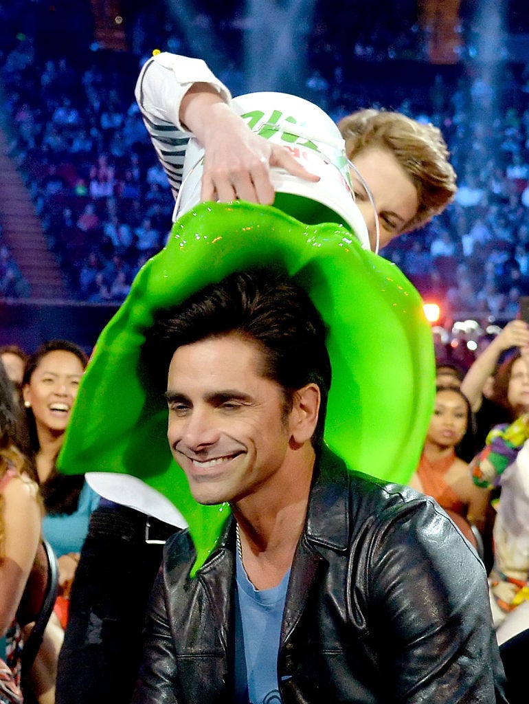 Head, Jacket, Leather jacket, Audience, Leather, Fan, Balloon, Celebrating, Laugh, Holiday, 