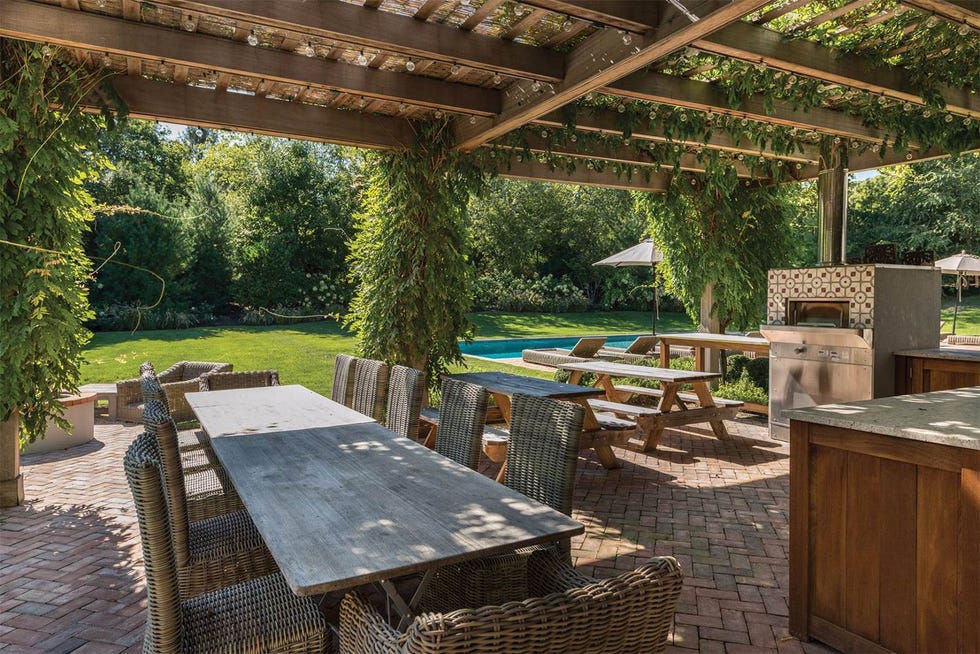 Wood, Table, Furniture, Outdoor table, Outdoor furniture, Hardwood, Shade, Resort, Pergola, Outdoor structure, 