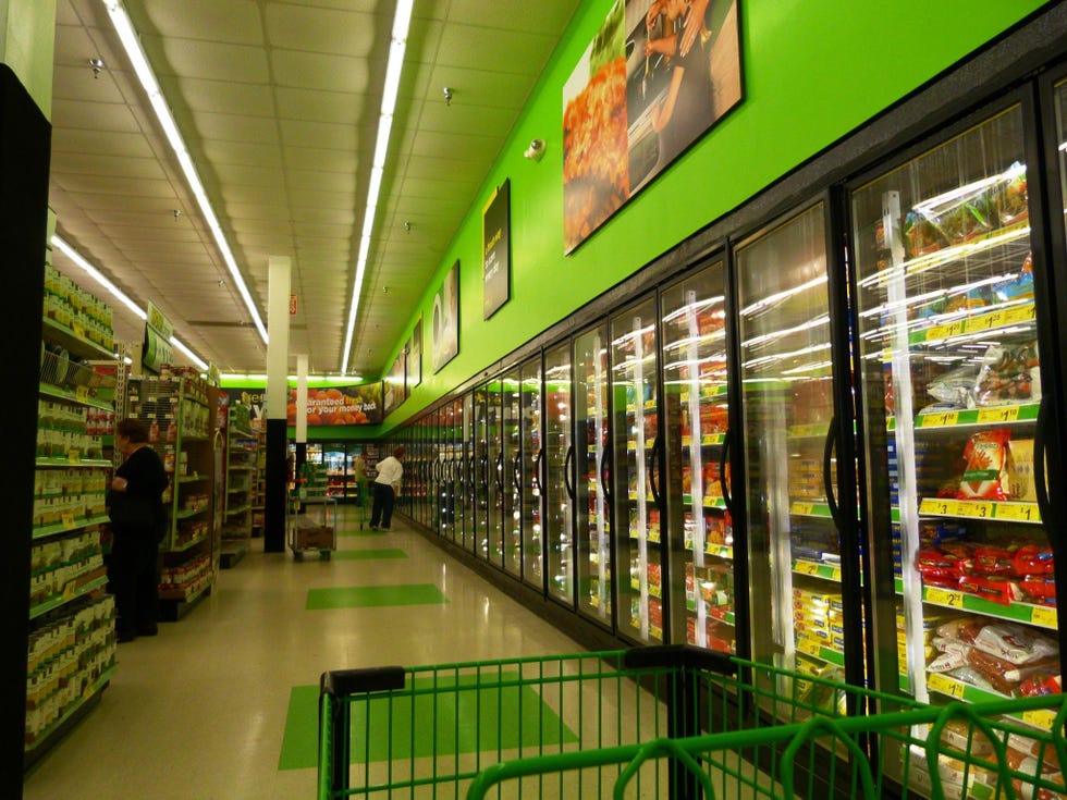 Supermarket, Building, Aisle, Green, Retail, Convenience store, Grocery store, Architecture, Interior design, Shopping mall, 