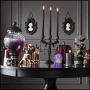 Purple, Lighting, Room, Still life photography, Table, Interior design, Still life, Furniture, Candle, Lighting accessory, 