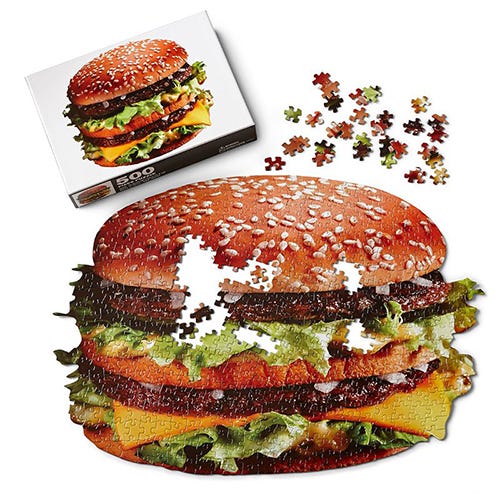 <p><strong data-redactor-tag="strong" data-verified="redactor"><em data-redactor-tag="em" data-verified="redactor">$10</em></strong> <a href="https://smilemakersonline.com/big-mac-puzzle/" target="_blank" class="slide-buy--button" data-tracking-id="recirc-text-link">BUY NOW</a></p><p>Make sure to stock up first, because you'll need a few real-life&nbsp;Big Macs worth of fuel to&nbsp;complete this 500-piece puzzle.&nbsp;</p>