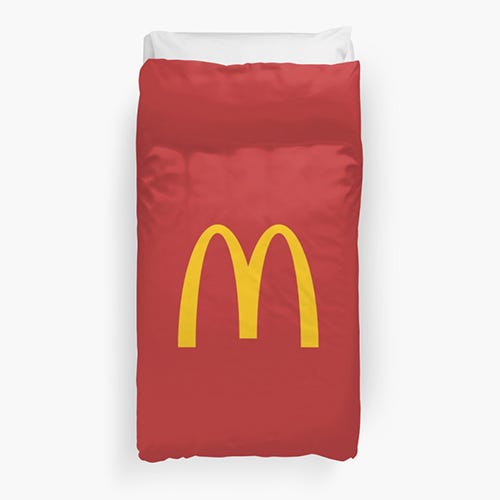<p><strong data-redactor-tag="strong" data-verified="redactor"><em data-redactor-tag="em" data-verified="redactor">$95</em></strong> <a href="https://www.redbubble.com/people/crazycrazydan/works/26383056-mcdonalds?grid_pos=8&amp;p=duvet-cover&amp;rbs=df109fc0-8ceb-44dd-b473-24f1f5409a29&amp;ref=shop_grid" target="_blank" class="slide-buy--button" data-tracking-id="recirc-text-link">BUY NOW</a></p><p>You'll be the coolest kid in the dorm with&nbsp;this twin-sized McDonald's duvet that&nbsp;<em data-redactor-tag="em" data-verified="redactor">definitely</em> won't mark you permanently as the biggest stoner on campus.&nbsp;</p>