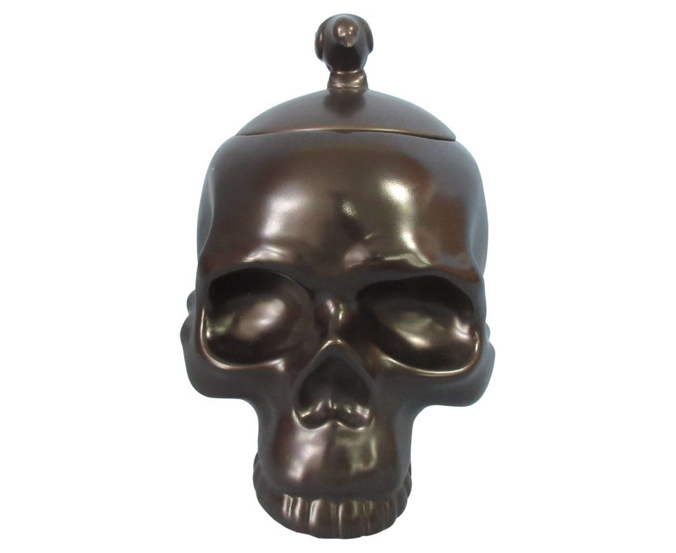 Brown, Jaw, Temple, Metal, Bronze, Bone, Symmetry, Sculpture, Skull, Bronze sculpture, 