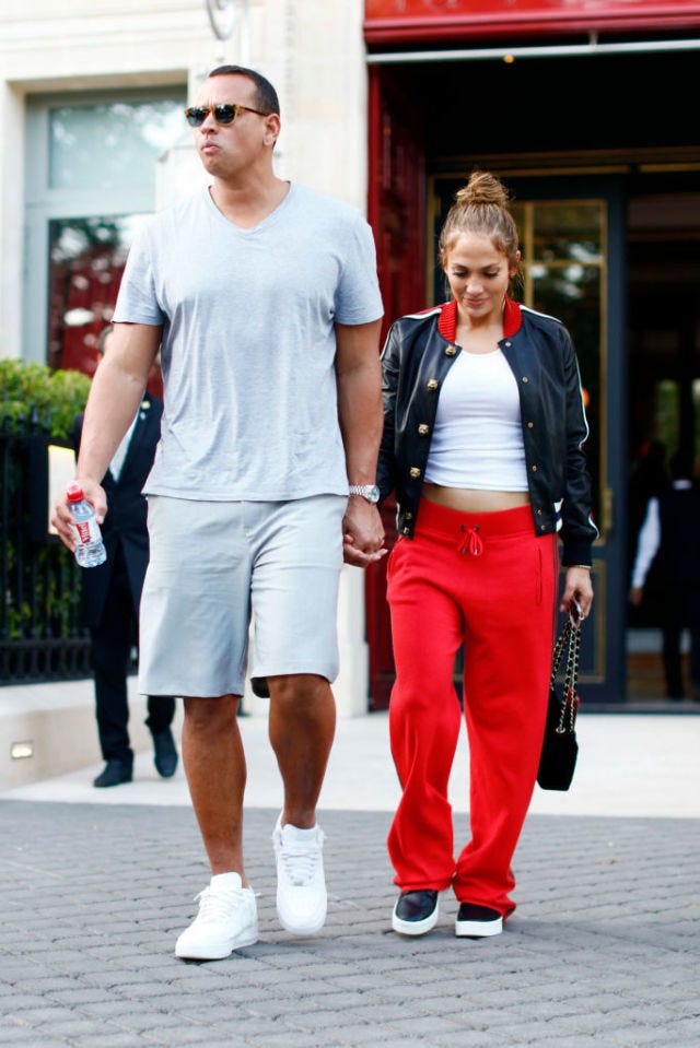 Clothing, Footwear, Leg, Shoe, Shirt, Outerwear, White, Standing, Red, T-shirt, 