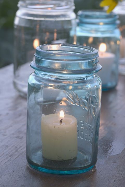 Mason jar, Lighting, Candle, Glass, Flameless candle, Lantern, Candle holder, Tableware, Interior design, 