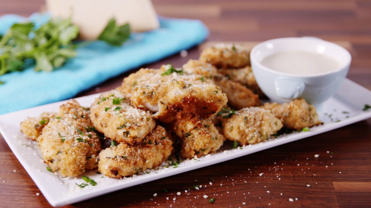 Video player poster image preview for These Garlic Parm Boneless Wings Are The Better Way To Eat Your Favorite App