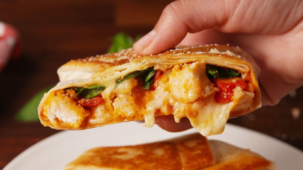 Video player poster image preview for This Chicken Parm Crunchwrap Will Blow Your Mind