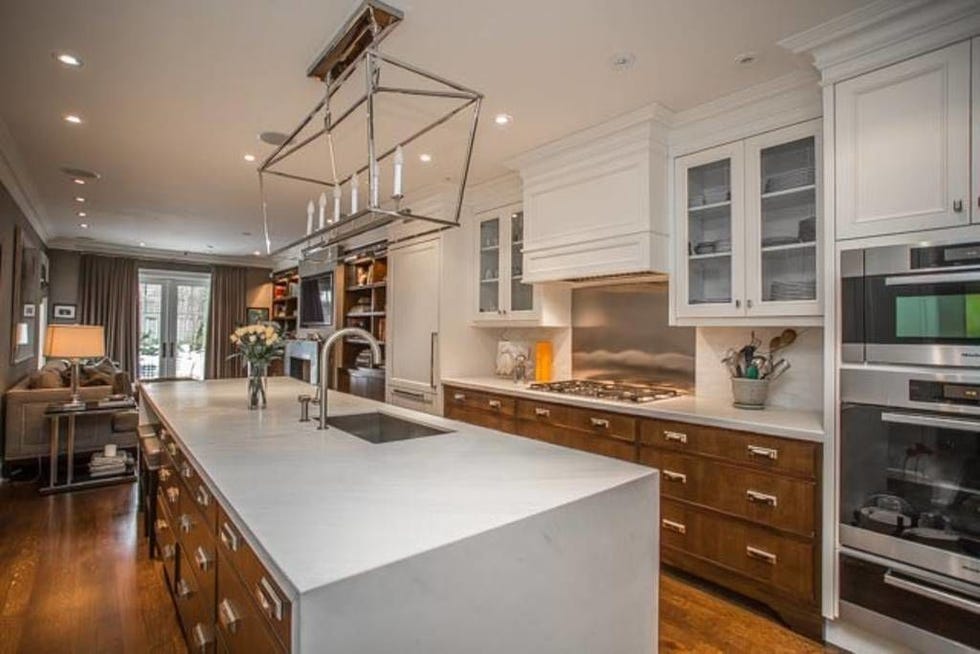 Wood, Interior design, Room, Brown, Floor, Property, Major appliance, Home, Flooring, Ceiling, 