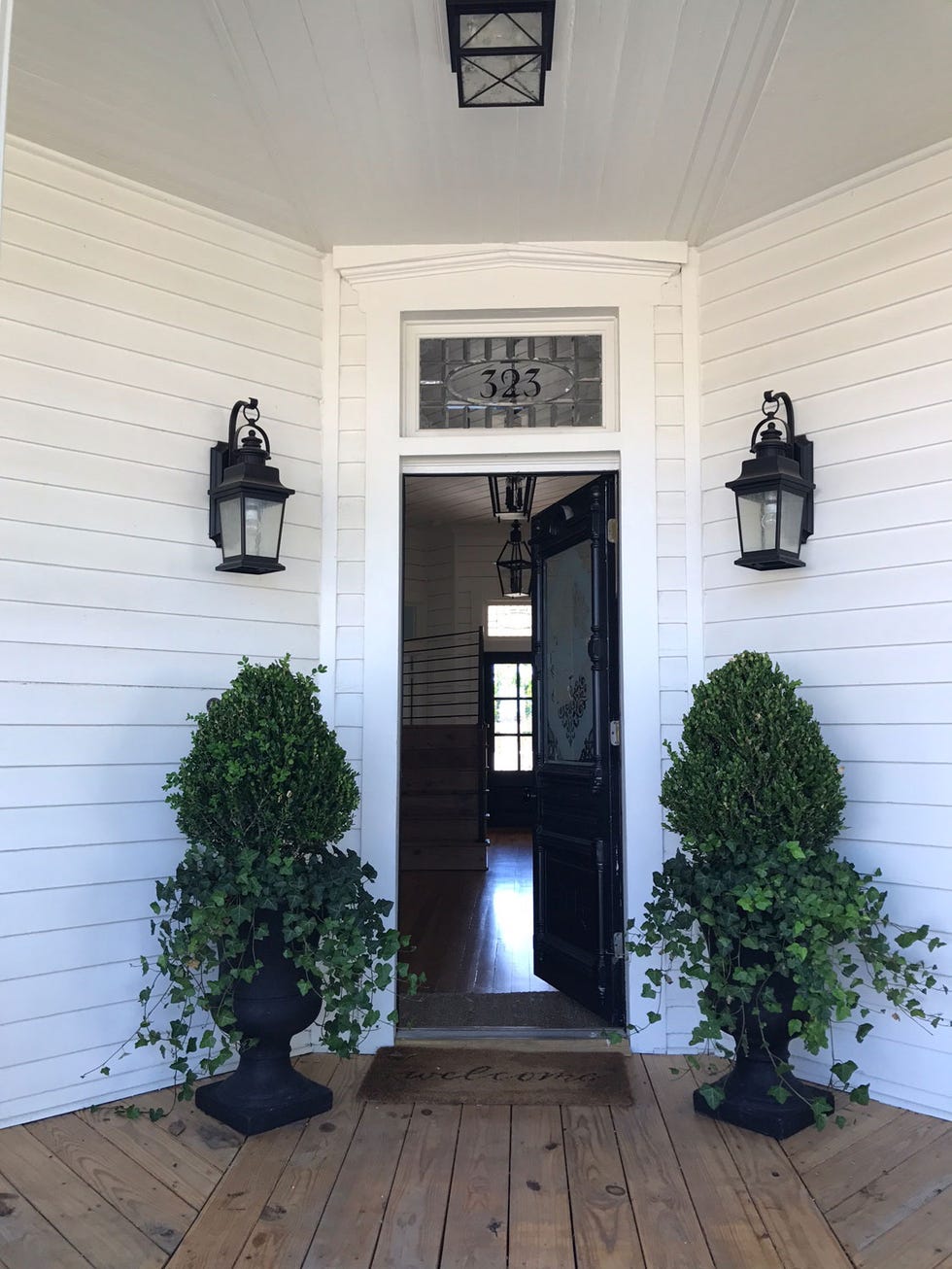 Lighting, Wood, Flowerpot, Plant, Property, Door, House, Hardwood, Light fixture, Ceiling, 