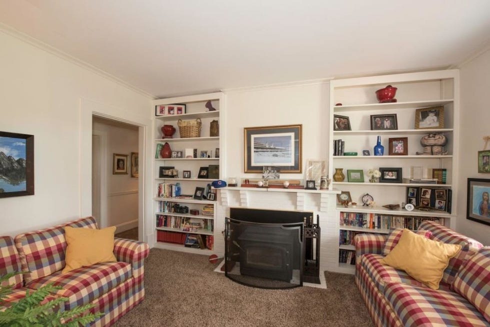 Room, Living room, Shelf, Furniture, Property, Shelving, Bookcase, Interior design, Real estate, Building, 