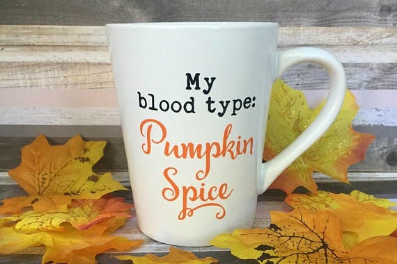 Mug, Coffee cup, Cup, Drinkware, Yellow, Tableware, Leaf, Cup, Text, Font, 