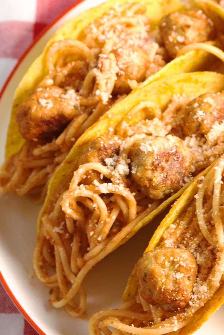 spaghetti and meatball tacos vertical