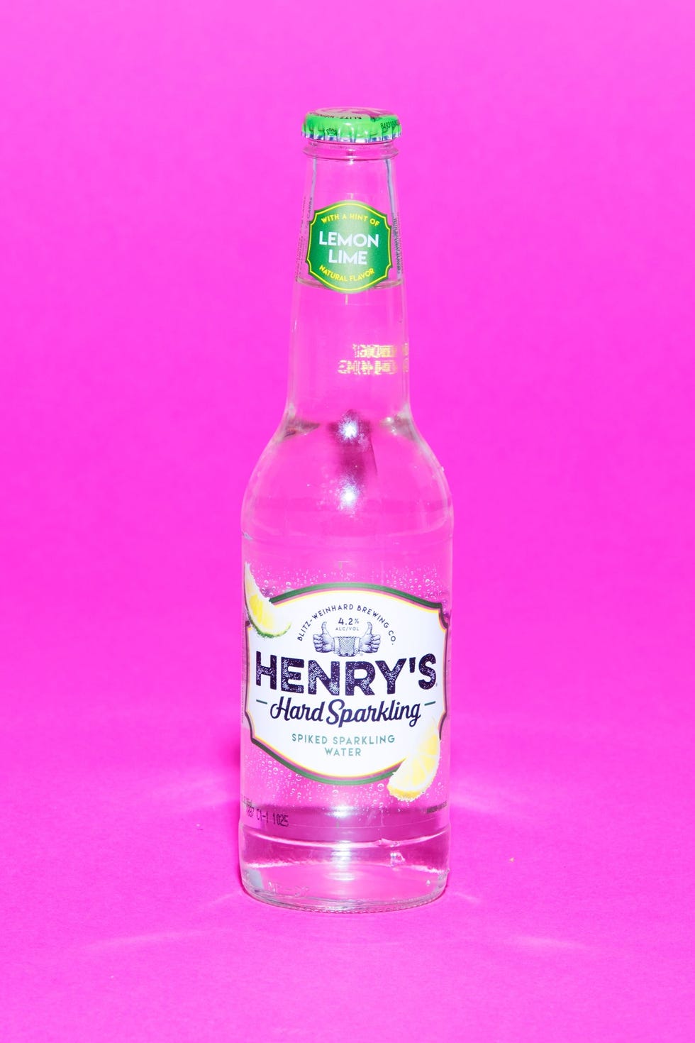 Drink, Liqueur, Product, Bottle, Alcoholic beverage, Pink, Distilled beverage, Glass bottle, Alcohol, Liquid, 