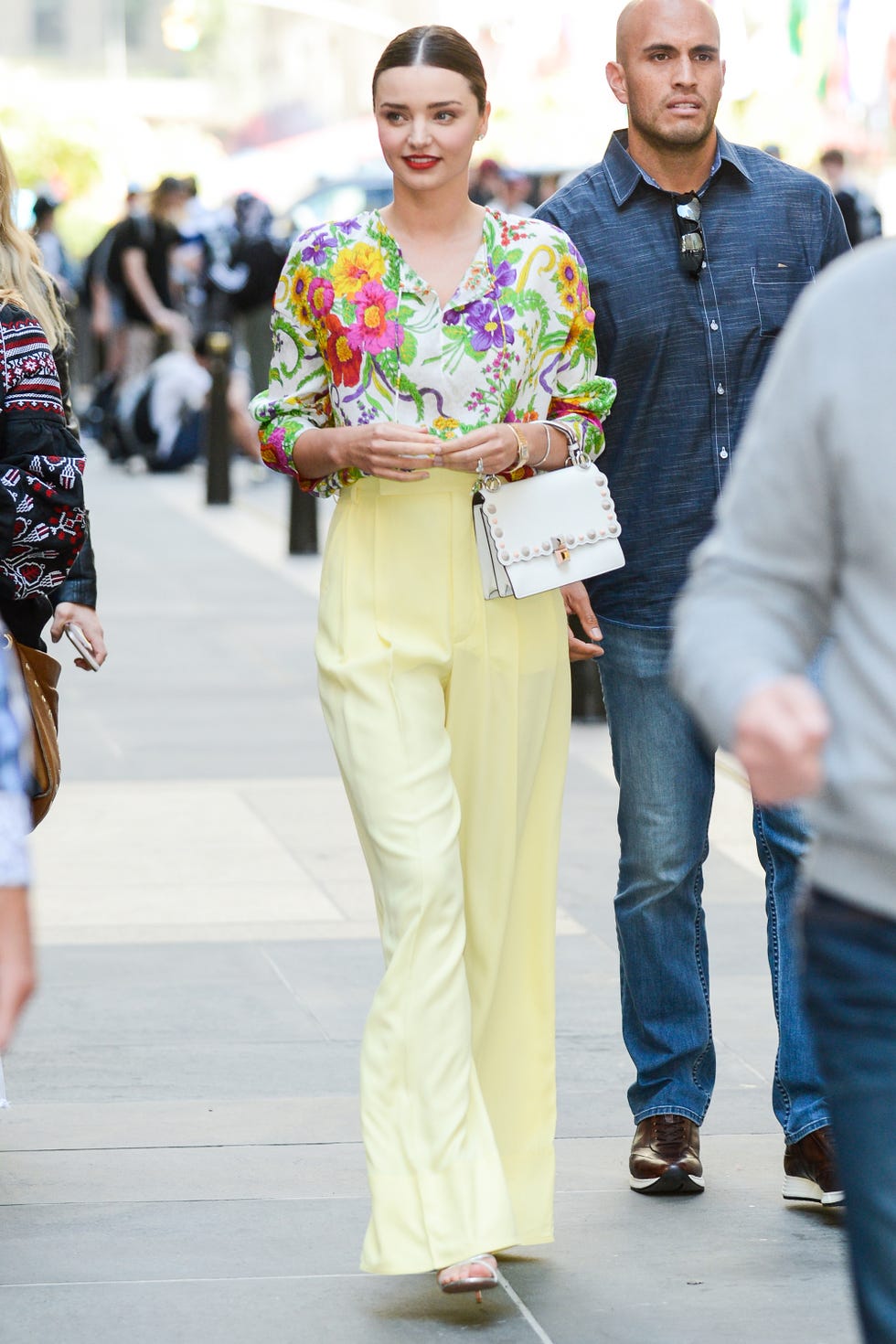 Fashion, Yellow, Street fashion, Hairstyle, Jeans, Human, Event, Footwear, Eyewear, Style, 