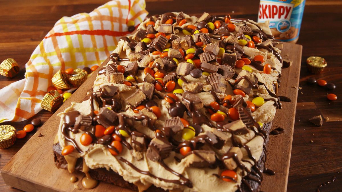 preview for This Chocolate Peanut Butter Poke Cake Is For Serious Reese’s Lovers Only