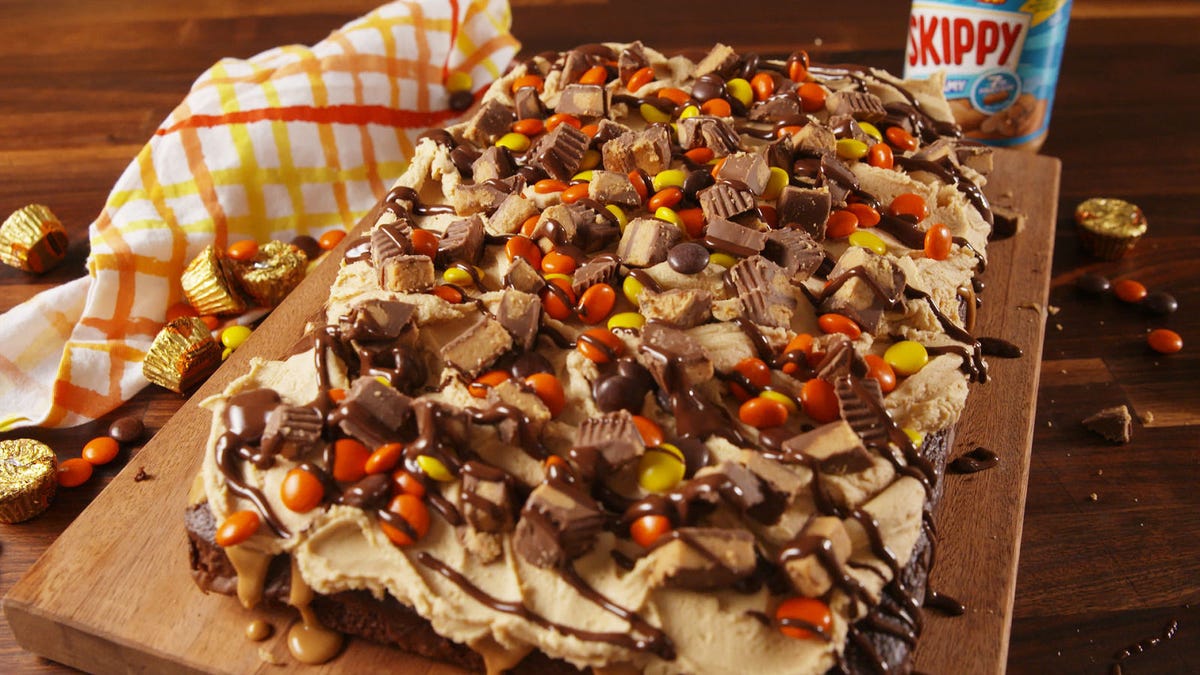 preview for This Chocolate Peanut Butter Poke Cake Is For Serious Reese’s Lovers Only