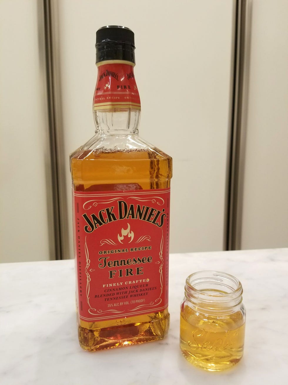 Drink, Liqueur, Alcoholic beverage, Distilled beverage, Bottle, Alcohol, Whisky, Scotch whisky, Glass bottle, Blended whiskey, 