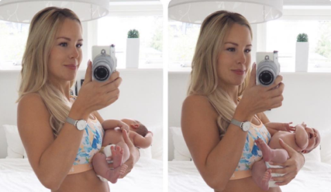 Uhrdin posing with her newborn baby